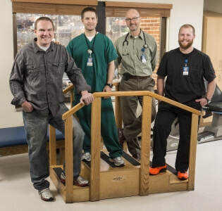 Adam with members of the St. Luke's inpatient rehabilitation team